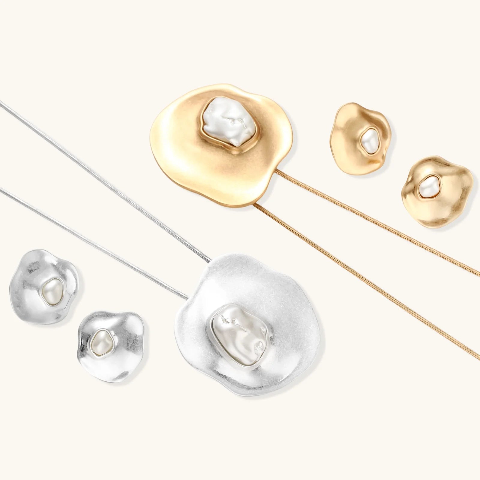 Organic-shaped eco-zinc alloy stud earrings with resin pearl centers and sterling silver posts on white background.