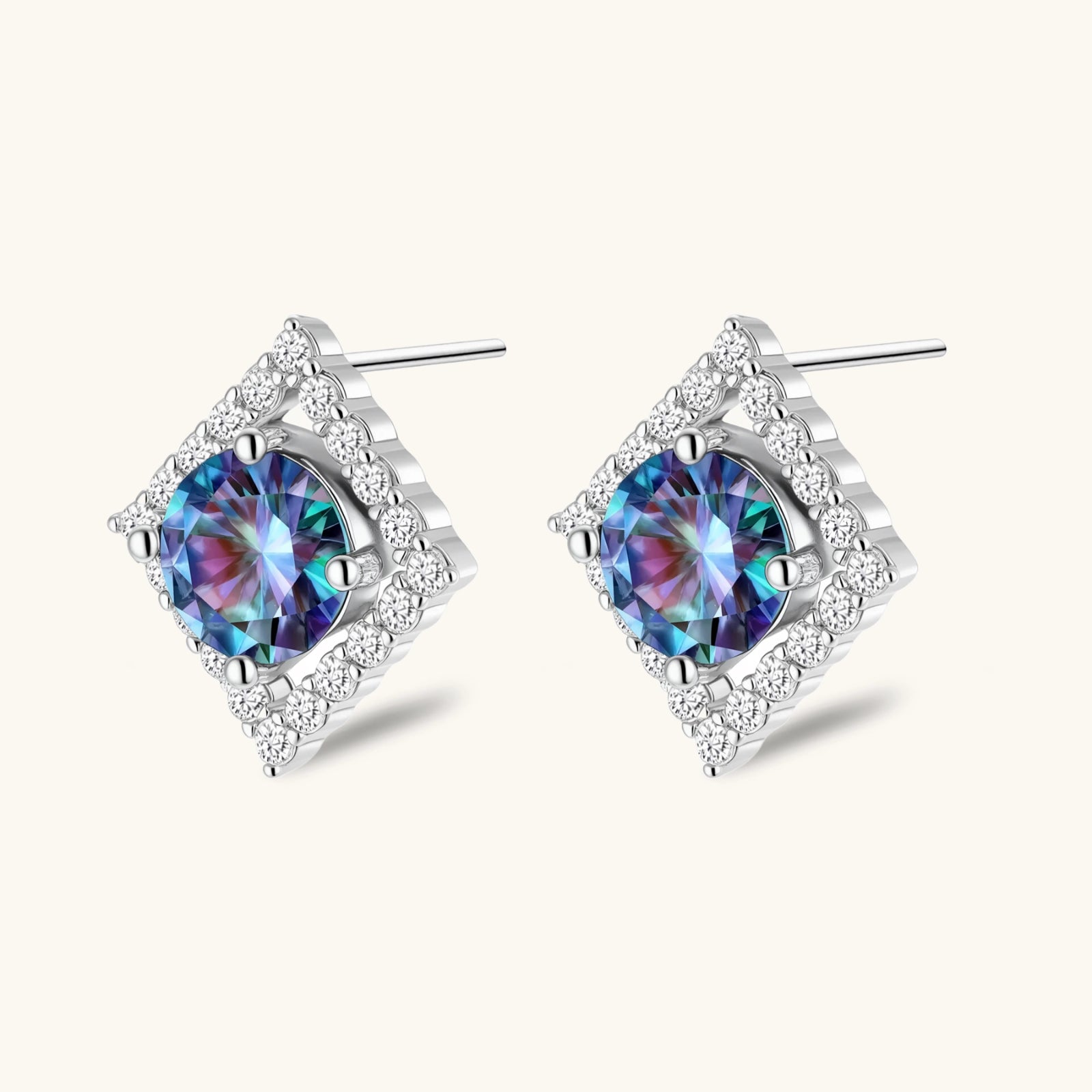 Diamond-shaped sterling silver stud earrings with rainbow moissanite centers surrounded by crystal halos