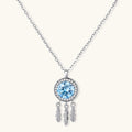Sterling silver dreamcatcher pendant with blue moissanite center and three feather charms on adjustable chain.