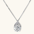 Sterling silver necklace featuring a large pear-shaped moissanite stone in an ornate setting with smaller accent stones
