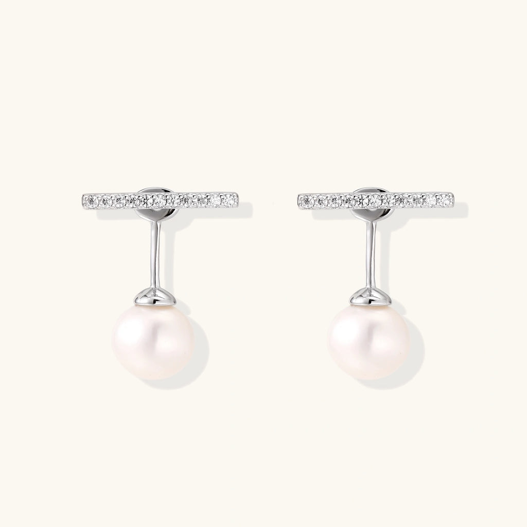 Rhodium-plated sterling silver ear jacket earrings with diamond-set horizontal bar and freshwater pearl drop