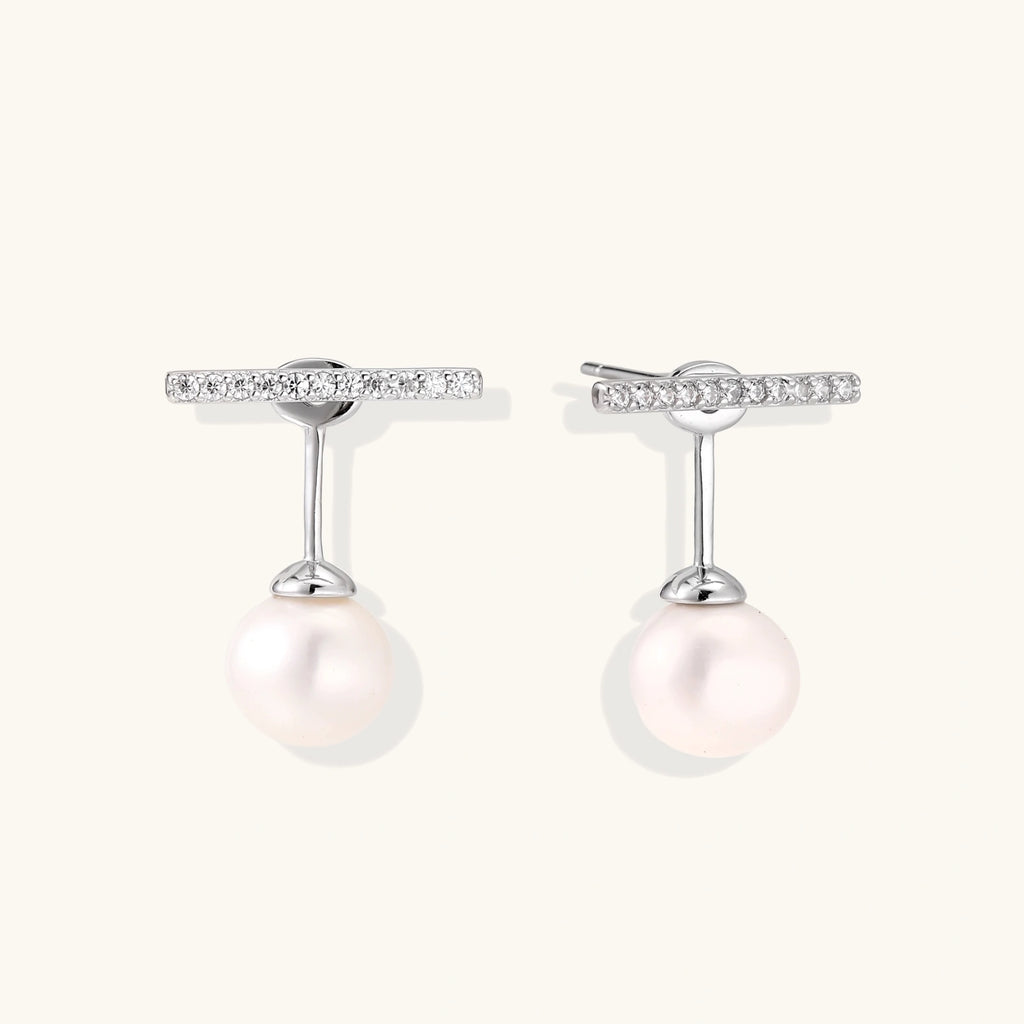 Rhodium-plated sterling silver ear jacket earrings with diamond-set horizontal bar and freshwater pearl drop