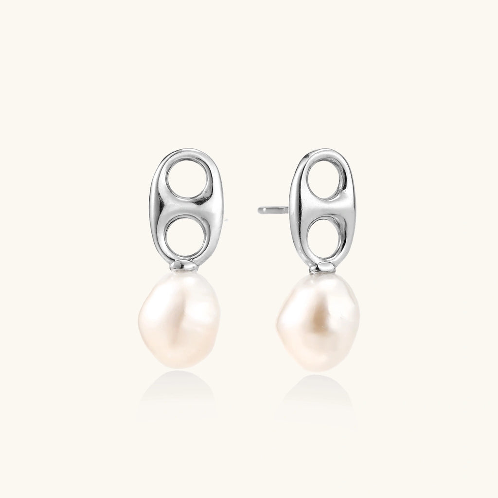 Modern rhodium-plated silver earrings with geometric double-circle design and freshwater pearl drops