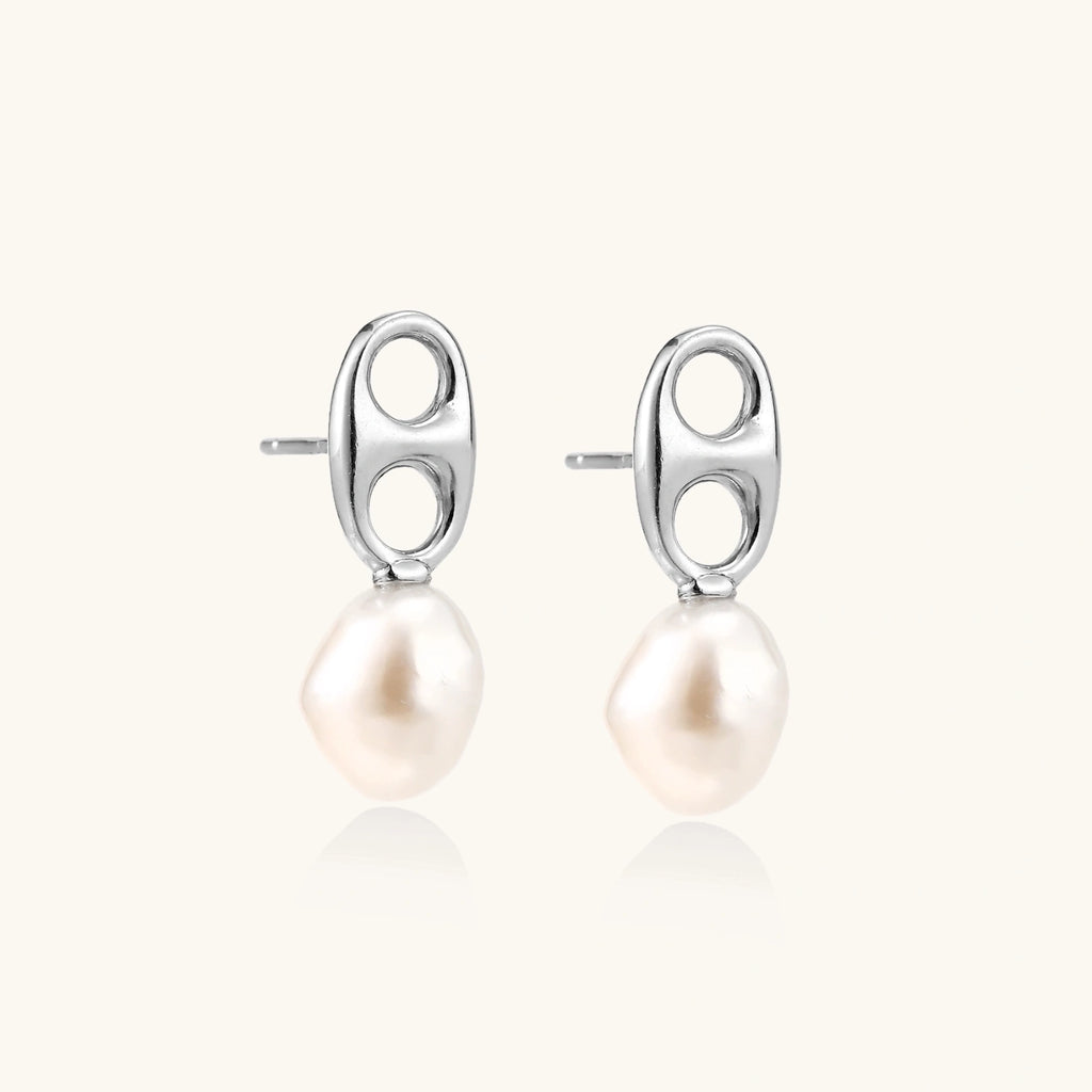 Modern rhodium-plated silver earrings with geometric double-circle design and freshwater pearl drops