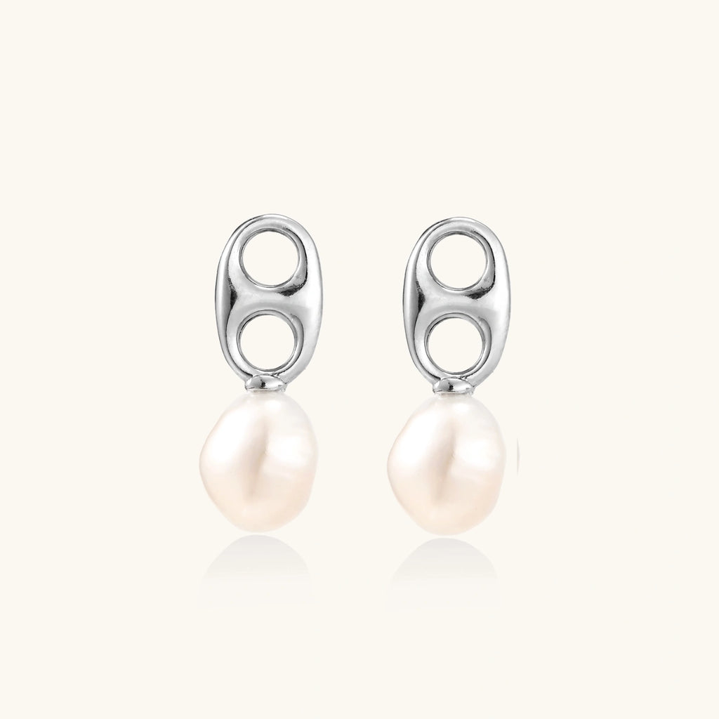 Modern rhodium-plated silver earrings with geometric double-circle design and freshwater pearl drops