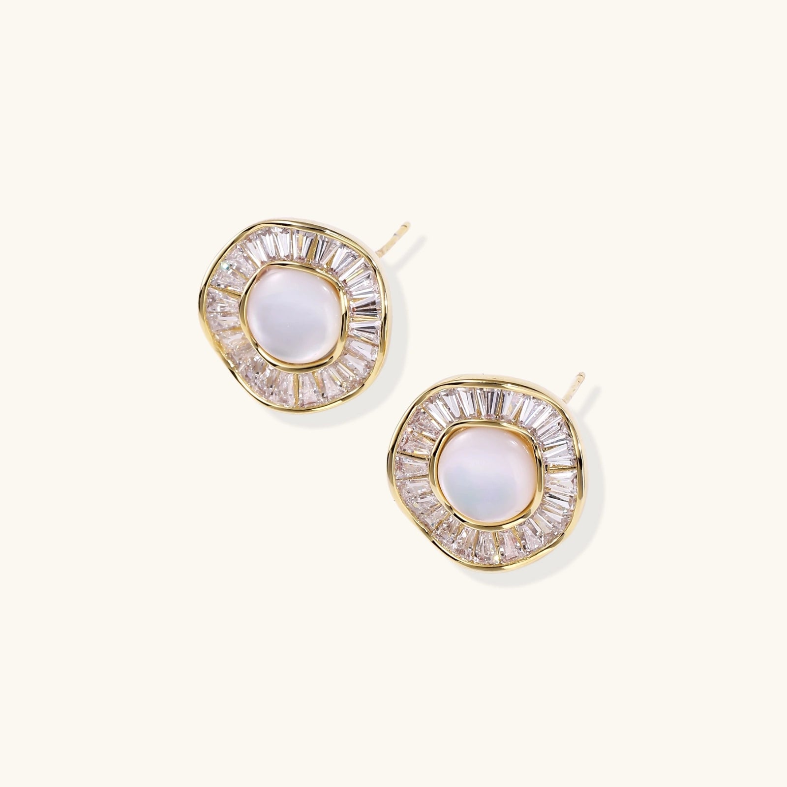 14K gold-plated stud earrings with freshwater pearl center surrounded by baguette-cut crystal halo in sunburst design