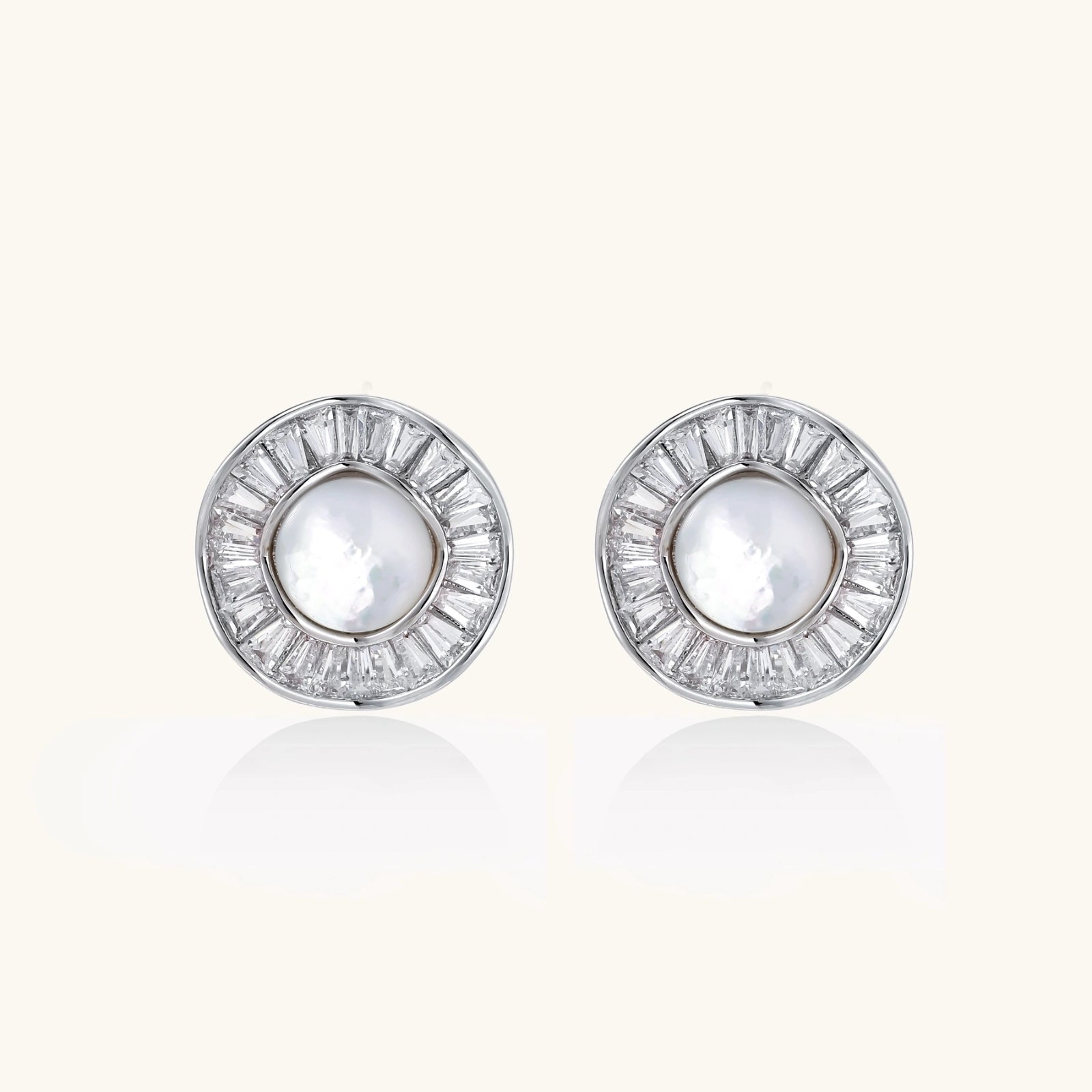 14K gold-plated stud earrings with freshwater pearl center surrounded by baguette-cut crystal halo in sunburst design