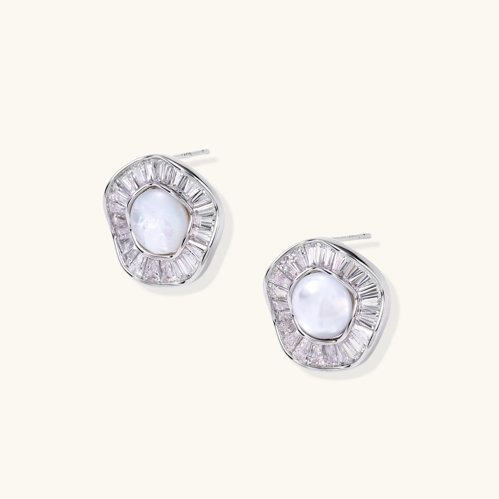 14K gold-plated stud earrings with freshwater pearl center surrounded by baguette-cut crystal halo in sunburst design